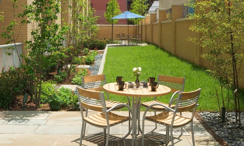 table and chairs on stone patio