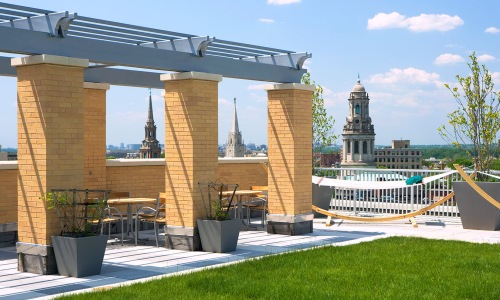 hammock on rooftop terrace with city views